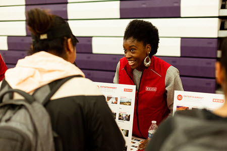 BECU employee talking with high school student